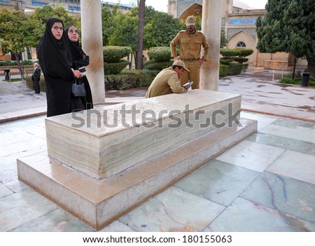 SHIRAZ, IRAN Ã¢Â?Â? NOVEMBER 26, 2007 Ã¢Â?Â? Iranian military servicemen with their wives visiting the Tomb of Persian poet Hafez in Shiraz. Hafez is supposed to be one of the most famous poets in Iran
