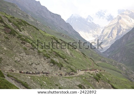 Pilgrims are coming back after the visiting a holy cave of Amarnath in the Himalayas