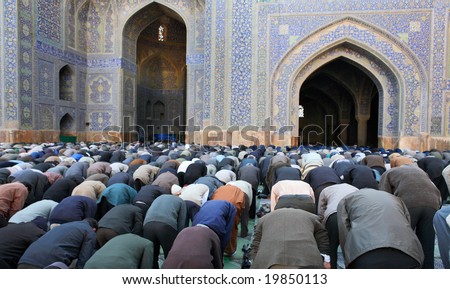 Muslim Friday mass prayer in Imam Mosque in Isfahan Iran Muslim Friday mass prayer in Imam Mosque in Isfahan Iran