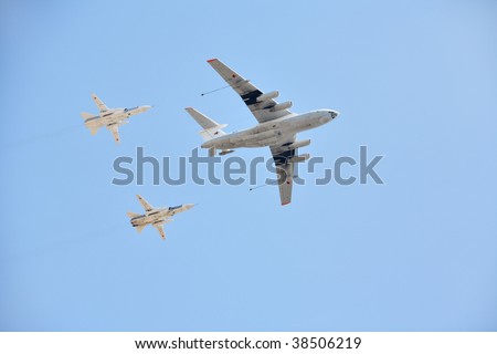 MOSCOW - MAY 9 : Russian Air Force airplanes (airborne early warning AWACS and Su-27) in formation at military parade devoted to the victory anniversary of the World War II May 9, 2009 in Moscow