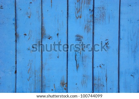 Blue grunge background of old bee hive wall.