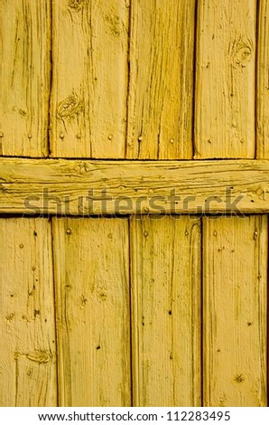 Old wooden painted wall architectural backdrop. Nails and old boards.