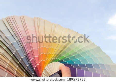 pastel warm tone of color palette samples on blue sky background
