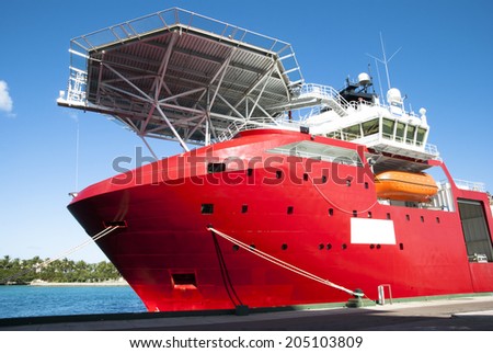 Bright red ship of scientists docked in Nassau, The Bahamas.