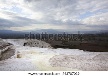 The landscape of Pamukkale painted by hot mineral waters, the World Heritage site in Turkey.