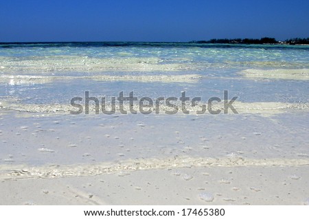 Little waves on Grand Bahama Island beach, The Bahamas.