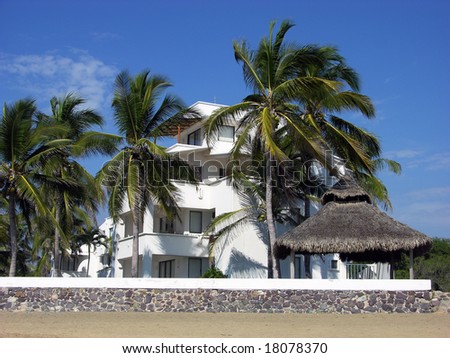 The resort building on a beach in Manzanillo city, Mexico.