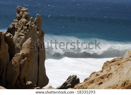Furious wave is breaking down on Lovers\' beach in Cabo San Lucas, Mexico.