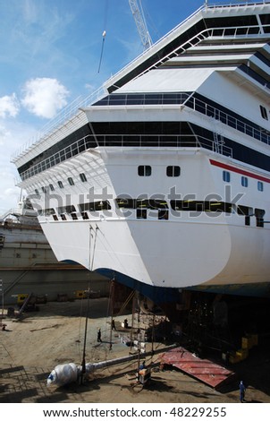 The one of propellers of the cruise liner is taken off for the repairing during the dry dock in Freeport on Grand Bahama Island, The Bahamas.