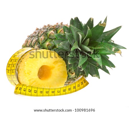 a pineapple, and peeled and meter for measuring for lose weight isolated on white background