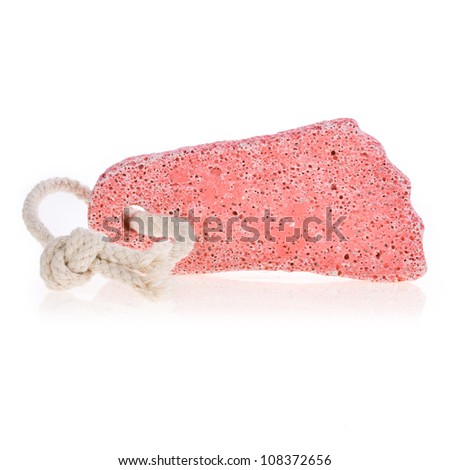 pumice foot shaped scrub tool isolated on white background