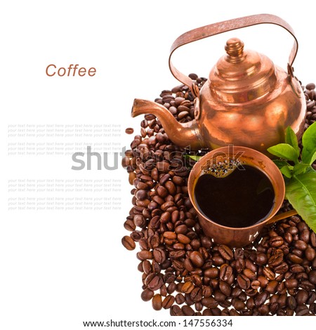 coffee beans, copper kettle and a copper cup of freshly brewed black coffee  isolated on white background