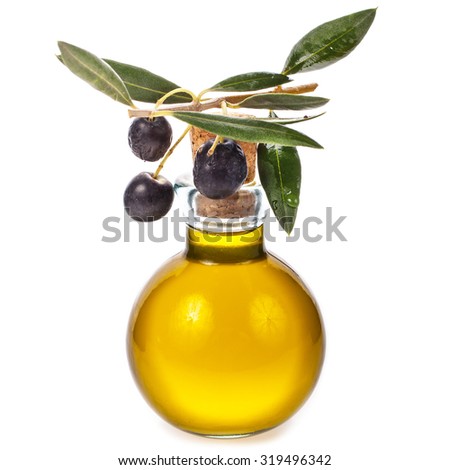 small glass bottle with olive oil, decorated with a small twig with black olives, fruit,  isolated on white background