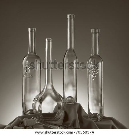 monochrome stillife ,old fashioned empty wine bottles