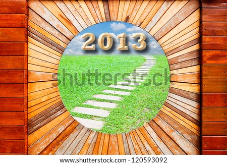 new year 2013 concept in Vintage wood pattern texture with walkway and blue sky background