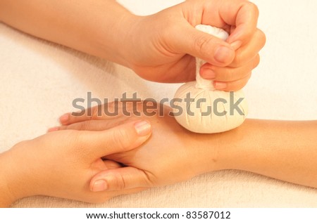 reflexology Hand massage by ball herbal, spa hand treatment,Thailand