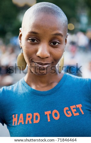 stock photo Young woman with shaved head