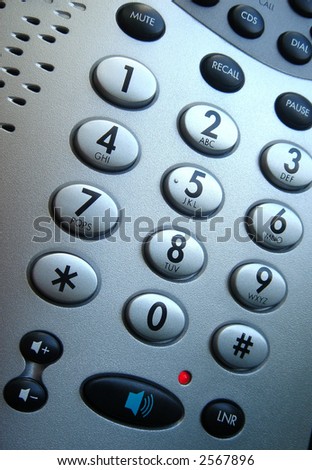 Close up of phone keypad with speaker button led