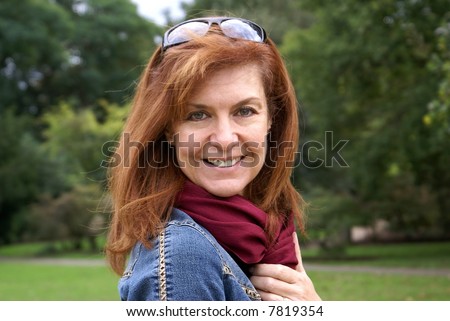Smiling female model in outdoor environment