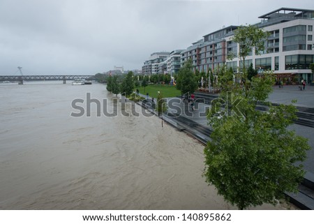  - stock-photo-bratislava-slovakia-june-level-of-water-in-danube-river-rises-and-starts-to-cover-promenade-140895862