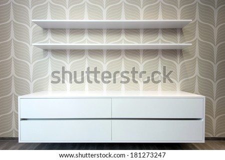 modern empty white wooden chest drawer with two shelves