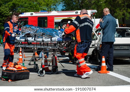PEZINOK, SLOVAKIA - MAY 4, 2014: Search and rescue operation during simulated car accident in Pezinok, Slovakia
