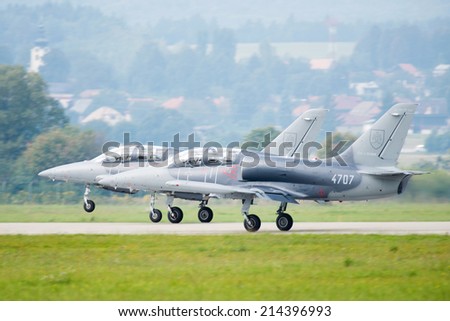 SLIAC, SLOVAKIA - AUGUST 30: Take-off of Aero L-39 Albatros jets on the SIAF airshow in Sliac, Slovakia on August 30, 2014