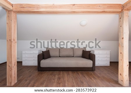 sofa with two cabinets in the attic