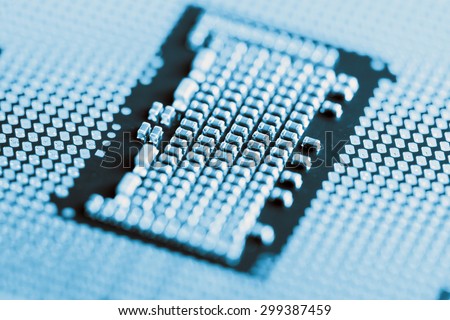 detail of CPU (Central Processing Unit) on white background - blue tone picture