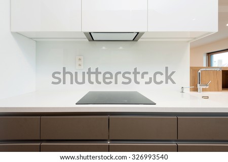 Contemporary kitchen worktop with induction cooker