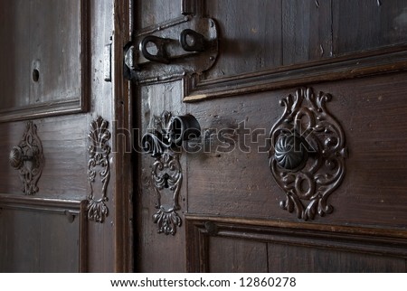 side view of old locked door
