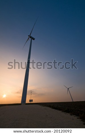 wind turbine silhouettes at dusk