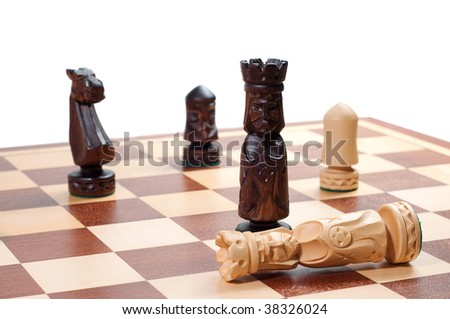 chess game - white king tripped over on the chess board