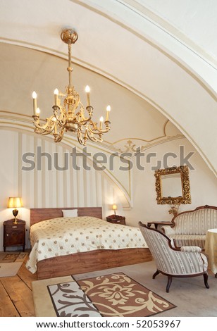 interior of a luxurious old style hotel room