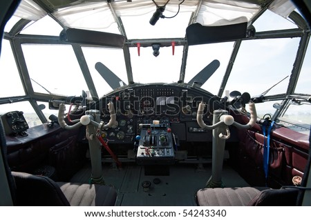 controls and equipment in cockpit of airplane
