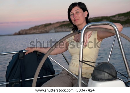 young woman on the yacht during vacation