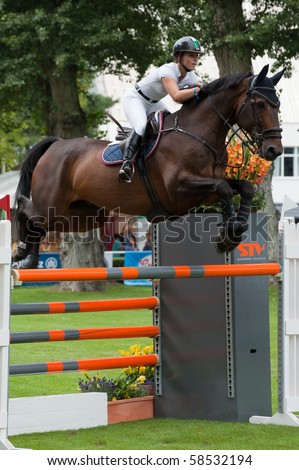BRATISLAVA, SLOVAKIA - AUGUST 5:  HUGYECZ Mariann on horse CASH 51 in action during first round of qualification to Grand Prix CSIO-W*** August 5, 2010 in Bratislava, Slovakia