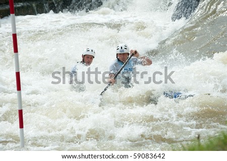 CUNOVO, SLOVAKIA - AUGUST 15: European Canoe Slalom Championships - third place in C2 Men category D. Florence and R. Hounslow (GBR), August 15, 2010 in Cunovo, Slovakia