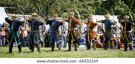 CERVENY KAMEN, SLOVAKIA - MAY 22:   members of historical archery club shoot on target at \