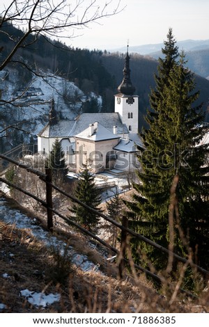 Historical church in old mining village Spania Dolina, Slovakia