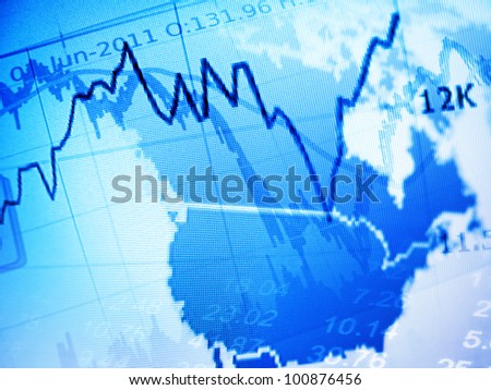 Financial diagram and abstract digital map of USA on a monitor