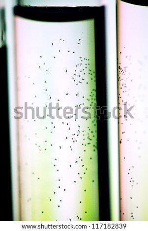 Test tubes with air bubble in water