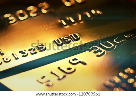 Gold credit card. Macro image