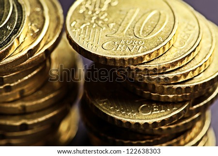 Euro coins on black background. Very small depth of field.