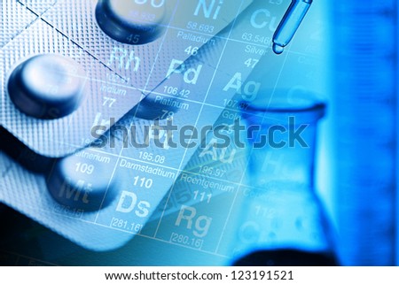 Blister of pills and laboratory tools. Medical or chemical background.