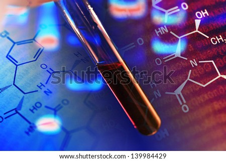 Blood in test tube and background with chemical formula.