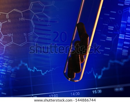 Pills in test tube over blue background.