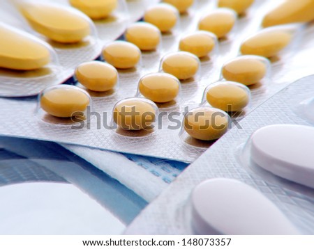 Tablets. Medicine symbol. Pincushion lens use.