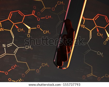 Pills in test tube over gray background. Science background.