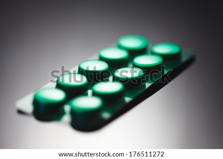 Tablets. Medicine symbol. Small depth of field.